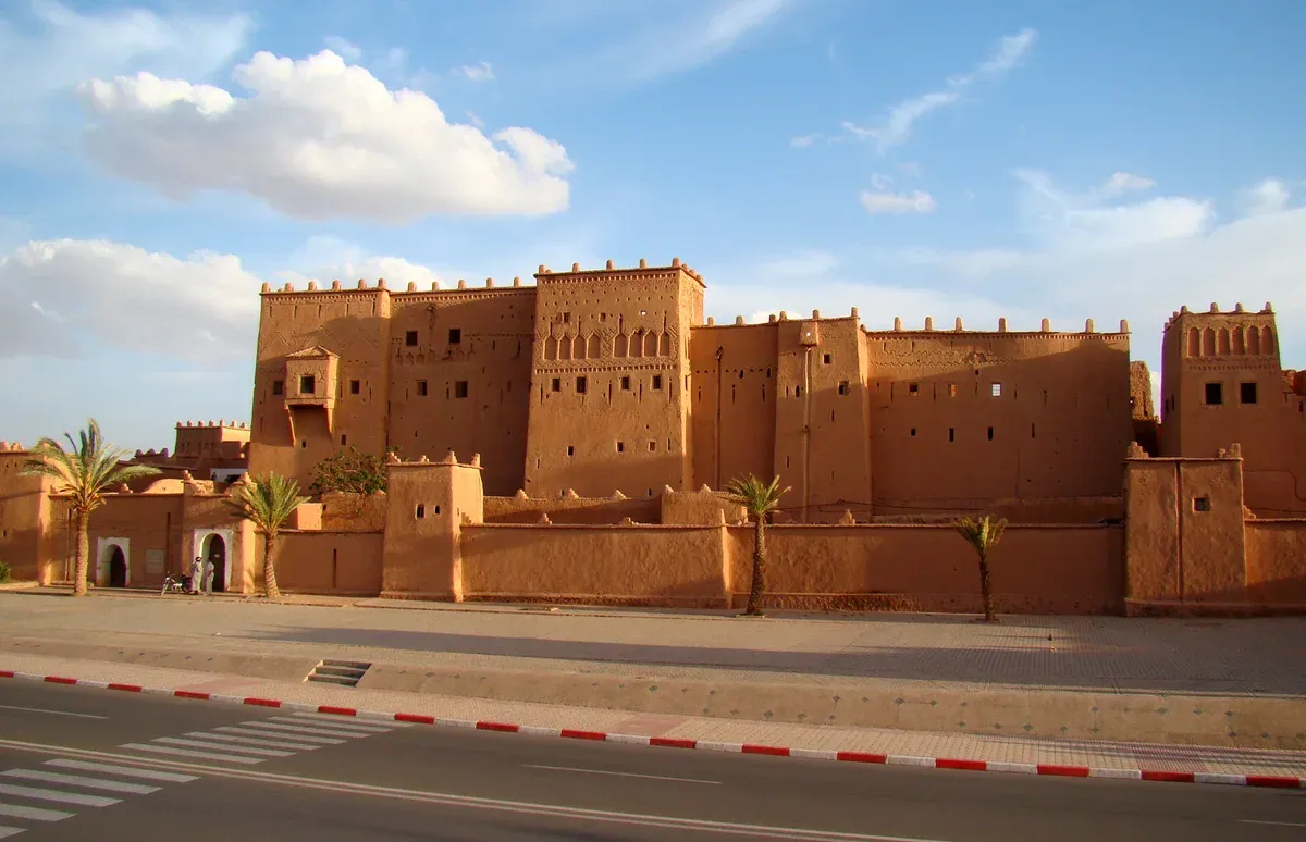 The mud-brick Taourirt Kasbah in Ouarzazate on a Morocco tour package, Taourirt Kasbah, Ouarzazate, Morocco